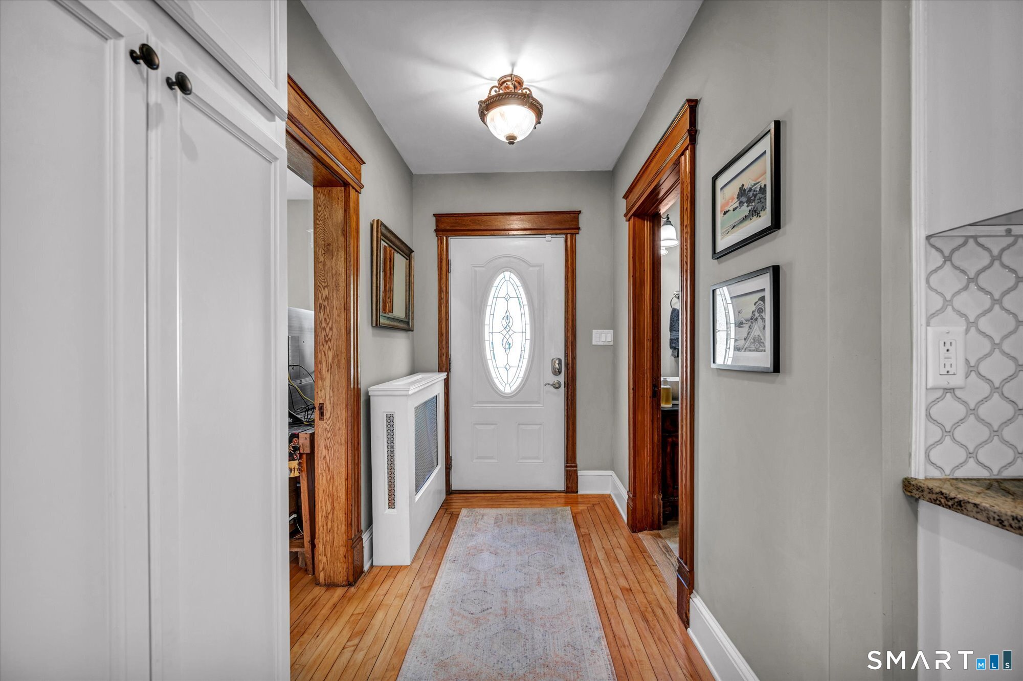 52 Stuart Street Newington, CT 06111 - Photo 8 of 33 Entryway looking at the front door