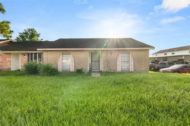 a house view with a garden space