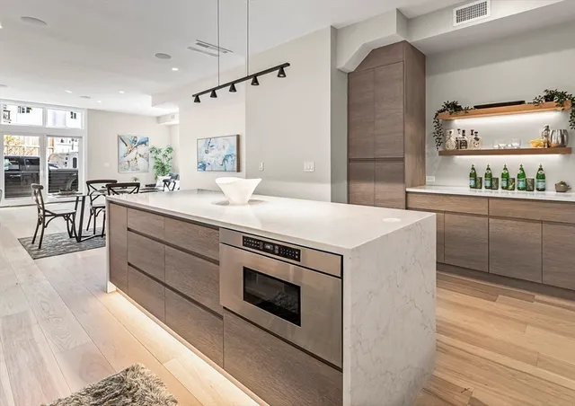 a bathroom with a sink a toilet and a bathtub