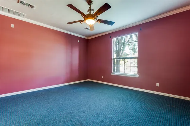 a view of a kitchen with a sink and a window