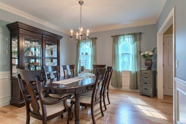 2 Otters Way Sterling, MA 01564 - Photo 12 of 30 a view of a dining room with furniture window and wooden floor