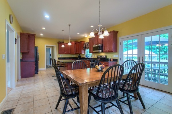 2 Otters Way Sterling, MA 01564 - Photo 10 of 30 a view of a dining room with furniture window and outside view