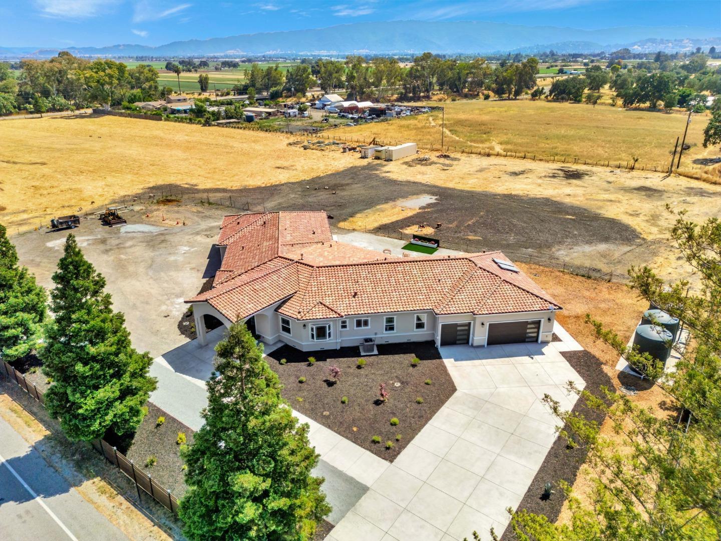 10055 Foothill Avenue Gilroy, CA 95020 - Photo 1 of 1 an aerial view of ocean and residential houses with outdoor space