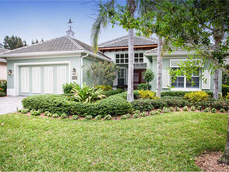 front view of a house with a small yard