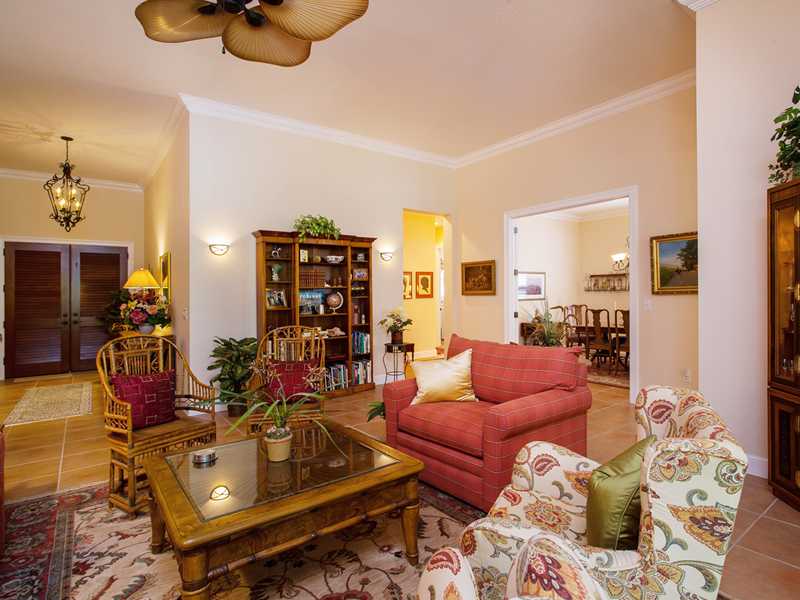 9120 Spring Time Drive Vero Beach, FL 32963 - Photo 14 of 17 a living room with furniture and a couch