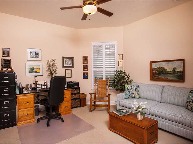 9120 Spring Time Drive Vero Beach, FL 32963 - Photo 15 of 17 a living room with furniture and a potted plant