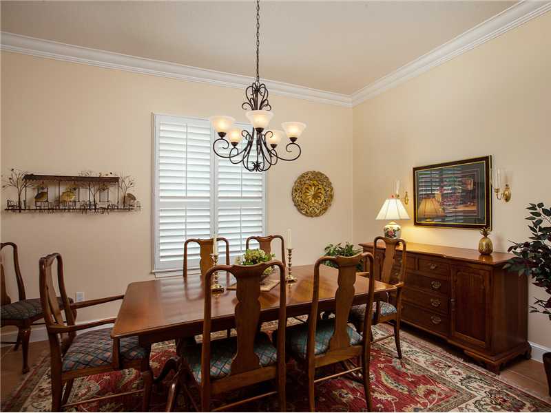 9120 Spring Time Drive Vero Beach, FL 32963 - Photo 4 of 17 a view of a dining room and livingroom view