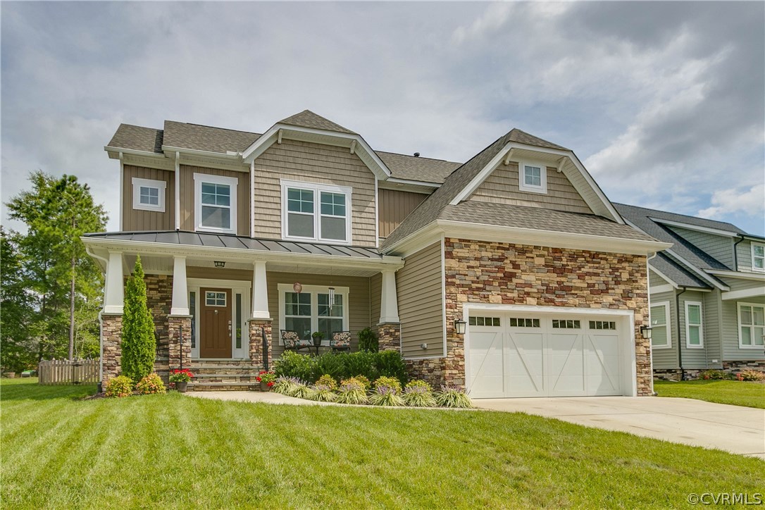 front view of a house with a yard