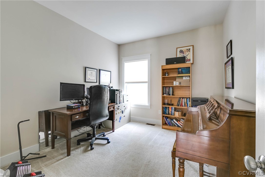 3237 Barkham Drive Midlothian, VA 23112 - Photo 21 of 48 a view of a workspace with furniture and a window