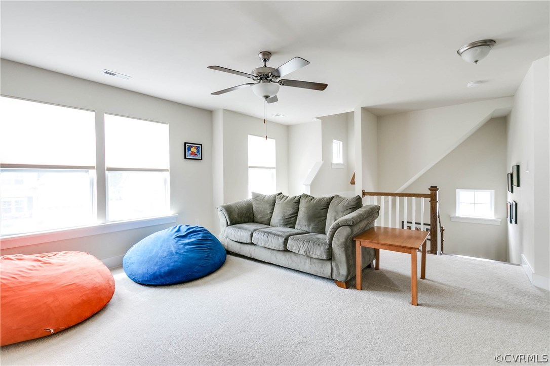 3237 Barkham Drive Midlothian, VA 23112 - Photo 24 of 48 a living room with furniture and a large window