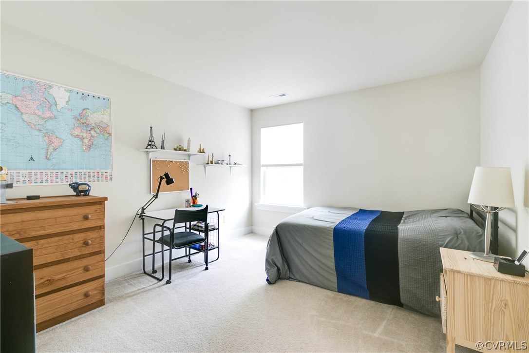 3237 Barkham Drive Midlothian, VA 23112 - Photo 25 of 48 a bedroom with a bed and furniture
