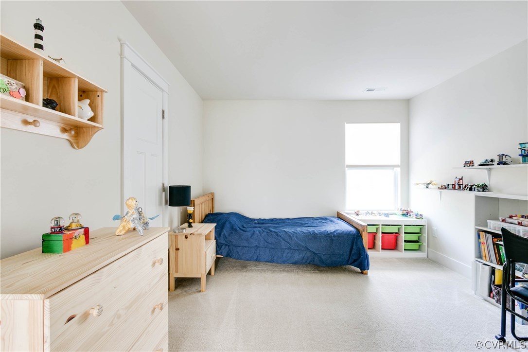 3237 Barkham Drive Midlothian, VA 23112 - Photo 28 of 48 a kids room with a bed and a window