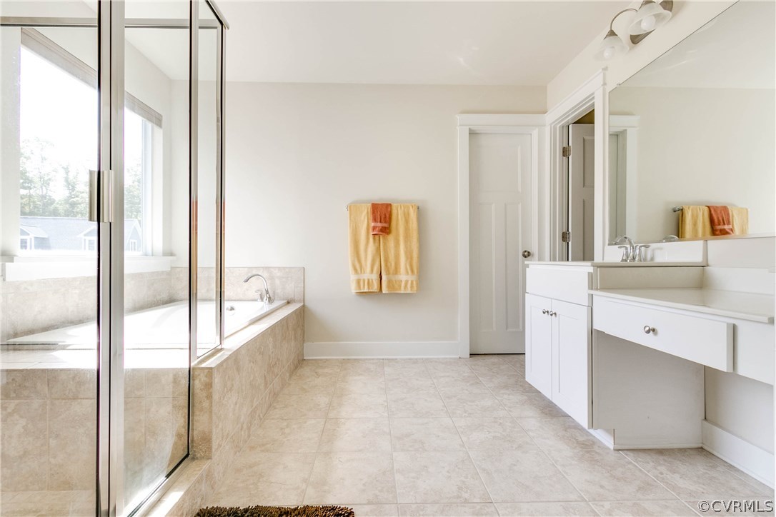 3237 Barkham Drive Midlothian, VA 23112 - Photo 33 of 48 a spacious bathroom with a tub sink and mirror
