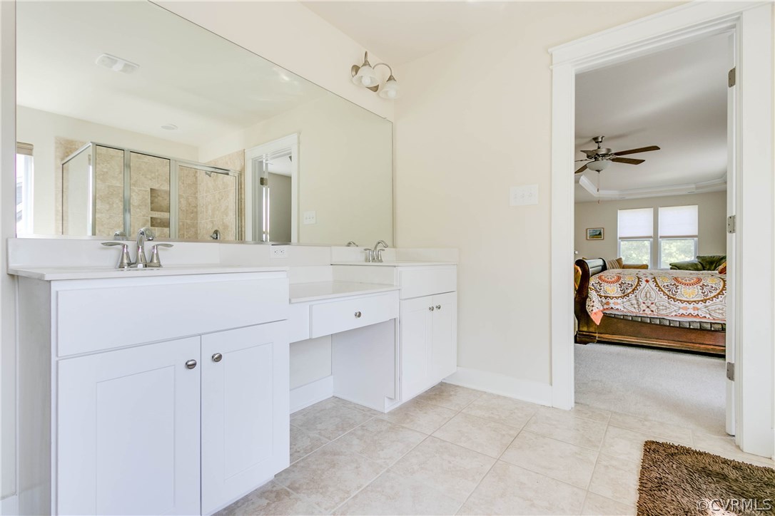 3237 Barkham Drive Midlothian, VA 23112 - Photo 34 of 48 a bathroom with a double vanity sink and mirror
