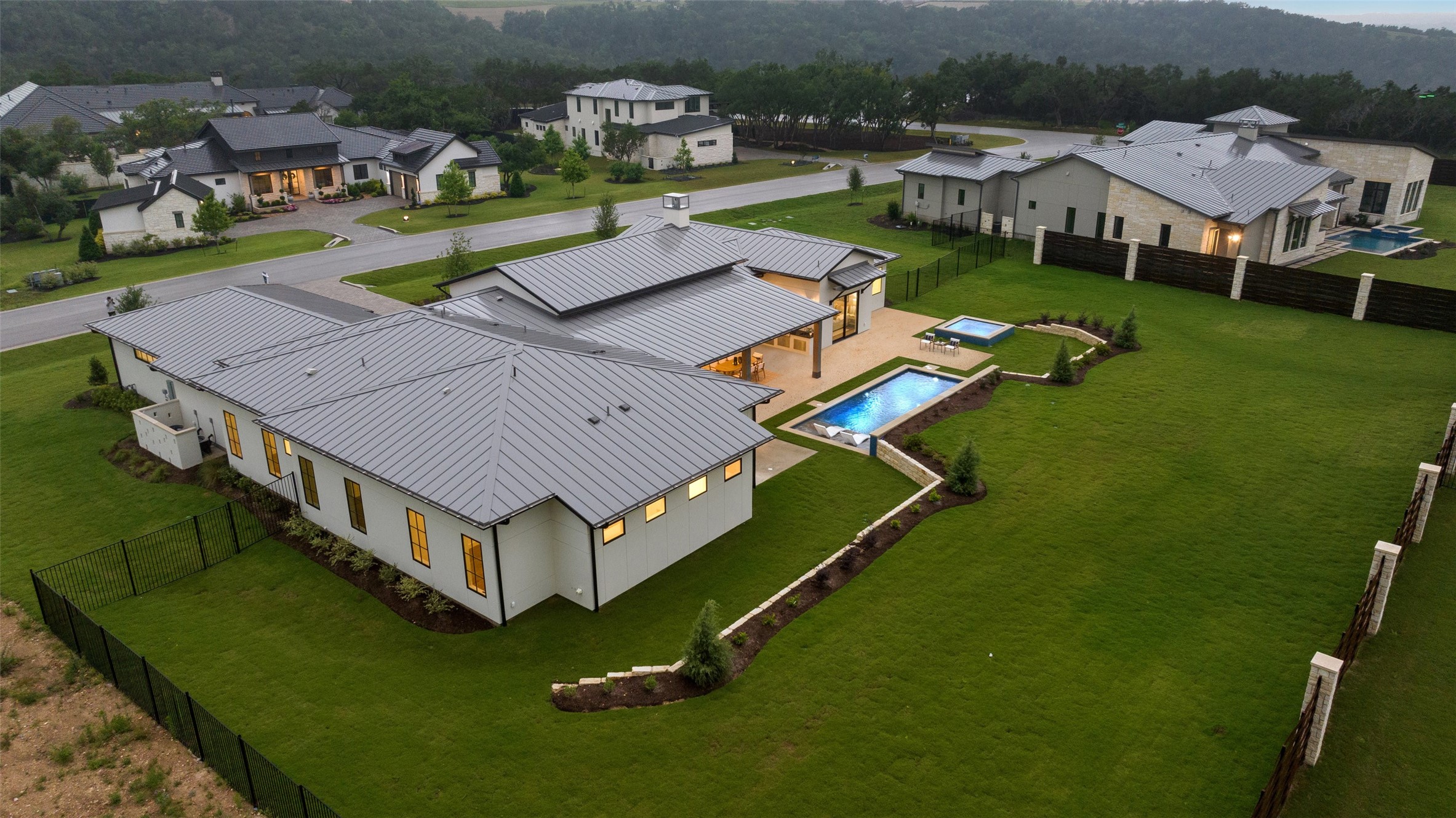 17212 Morning Grove Lane Austin, TX 78738 - Photo 34 of 38 an aerial view of a house with a garden