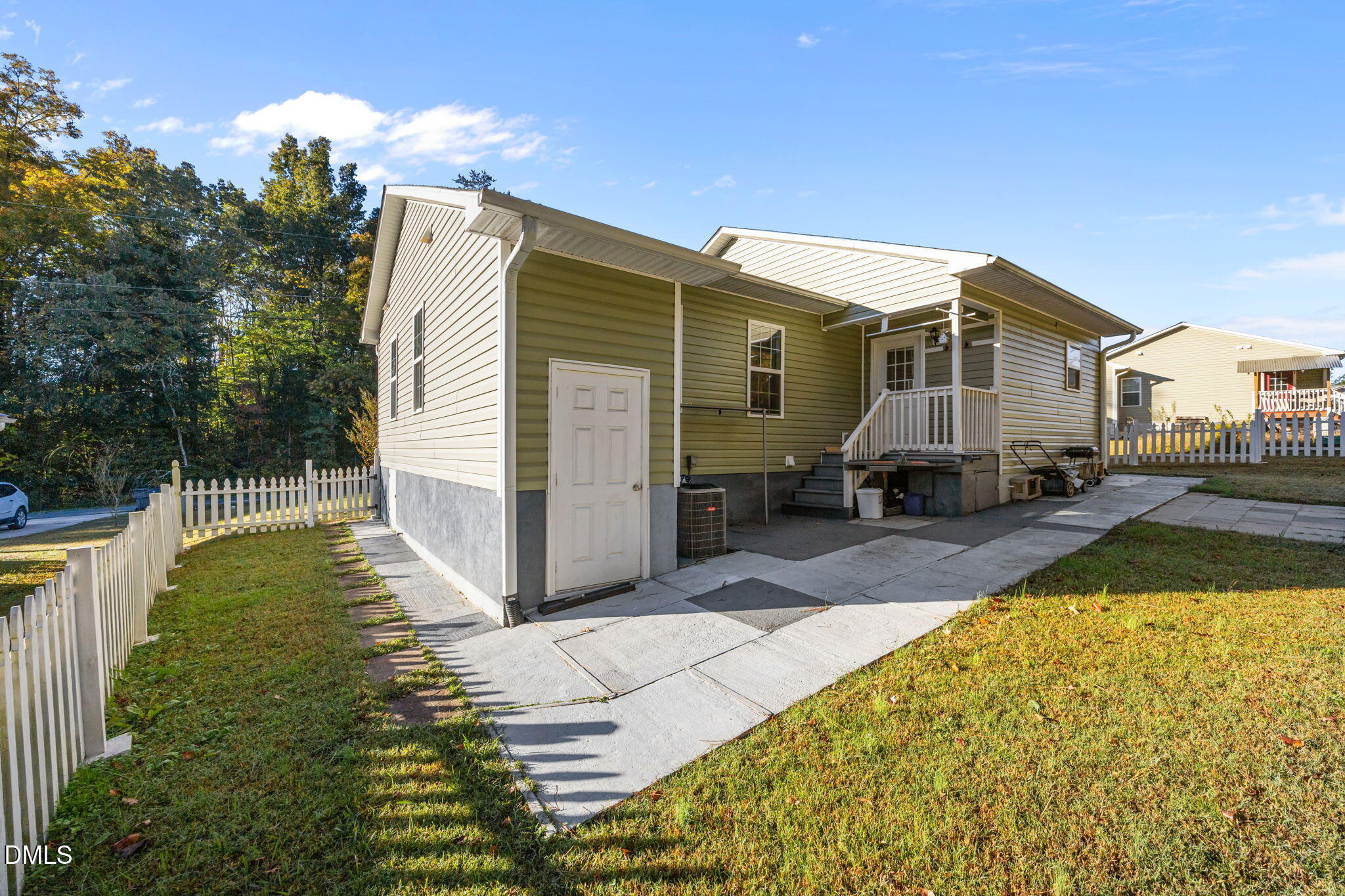 320 School House Road Efland, NC 27243 - Photo 13 of 18 a view of a house with backyard