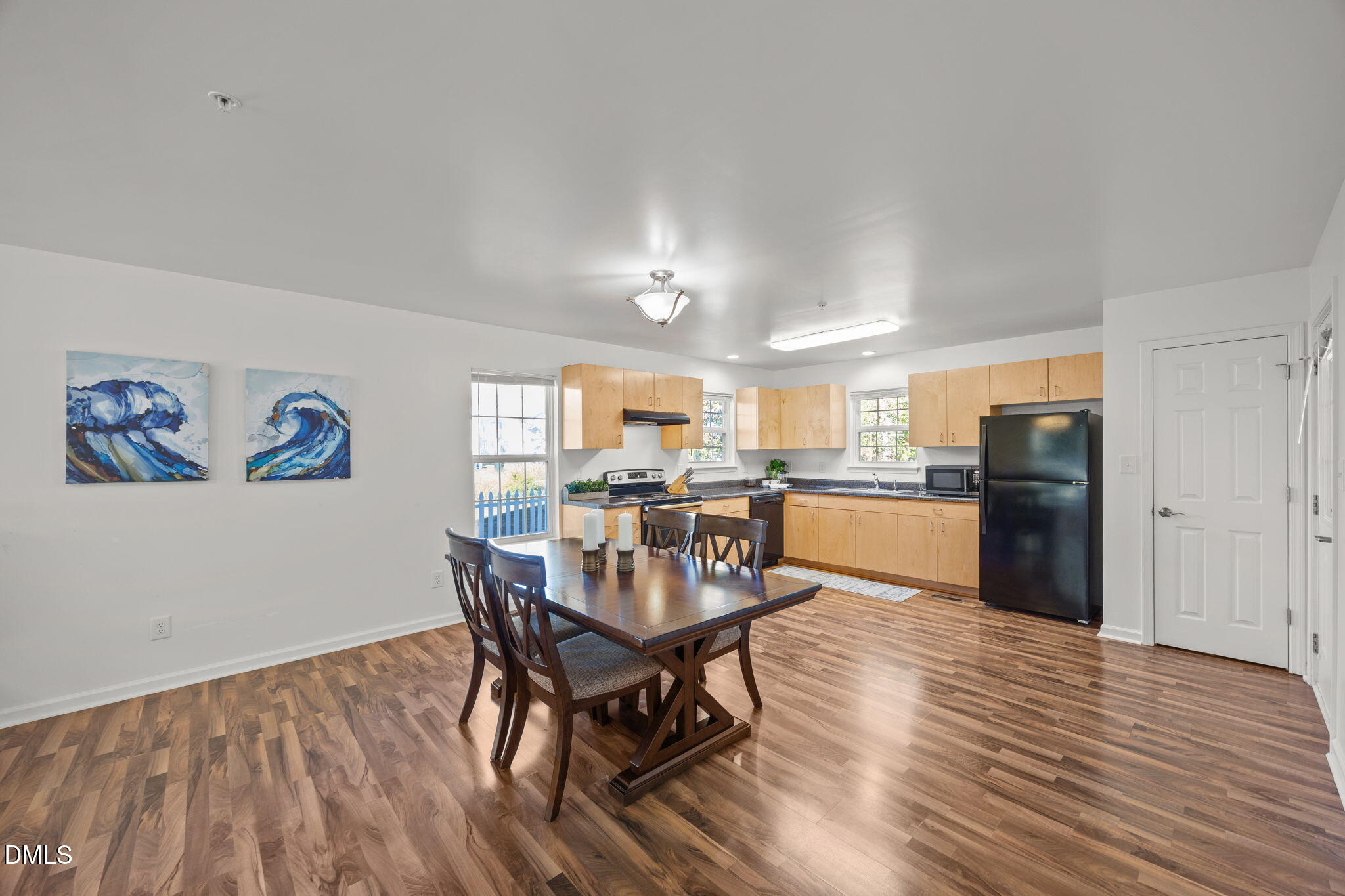 320 School House Road Efland, NC 27243 - Photo 6 of 18 a view of kitchen and dining room with wooden floor