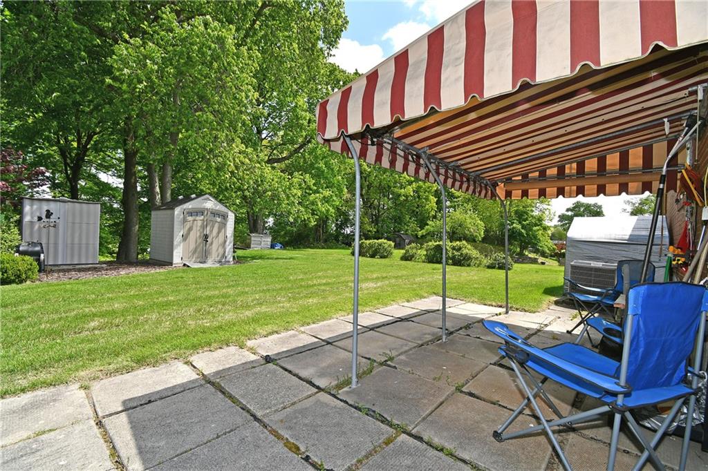 801 Highview Road Pittsburgh, PA 15234 - Photo 25 of 30 a view of a house with backyard and sitting area