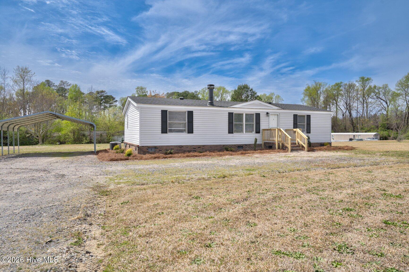 145 Red Oak Road Rocky Mount, NC 27801 - Photo 1 of 22 001-145RedOakRoad-RockyMount-NC-27801-SM