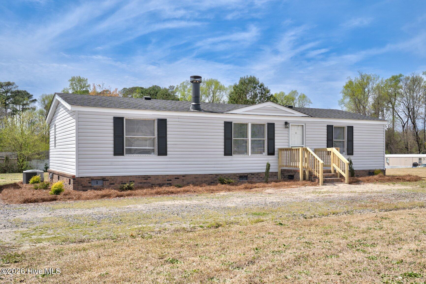 145 Red Oak Road Rocky Mount, NC 27801 - Photo 2 of 22 002-145RedOakRoad-RockyMount-NC-27801-SM