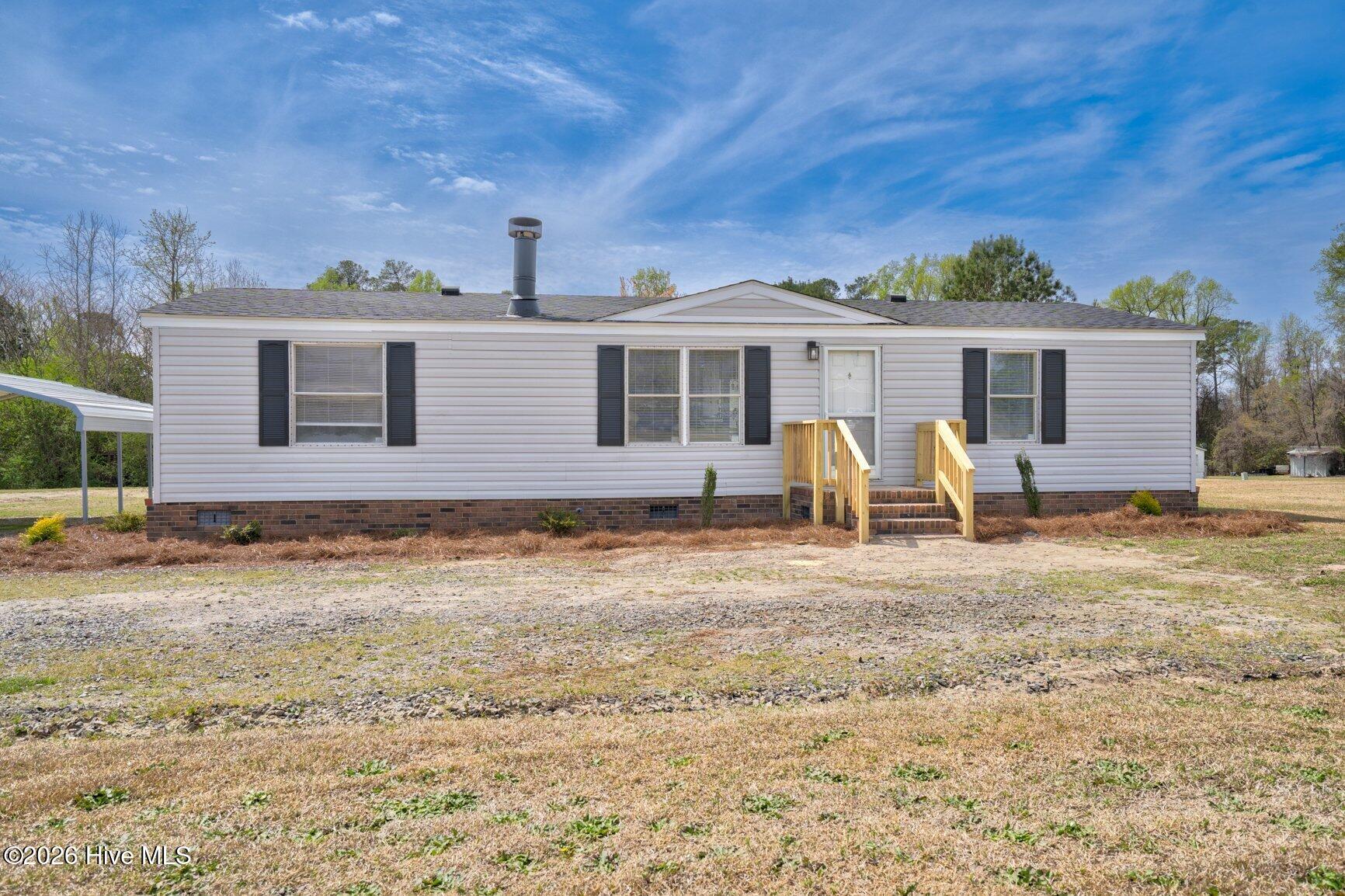 145 Red Oak Road Rocky Mount, NC 27801 - Photo 3 of 22 003-145RedOakRoad-RockyMount-NC-27801-SM