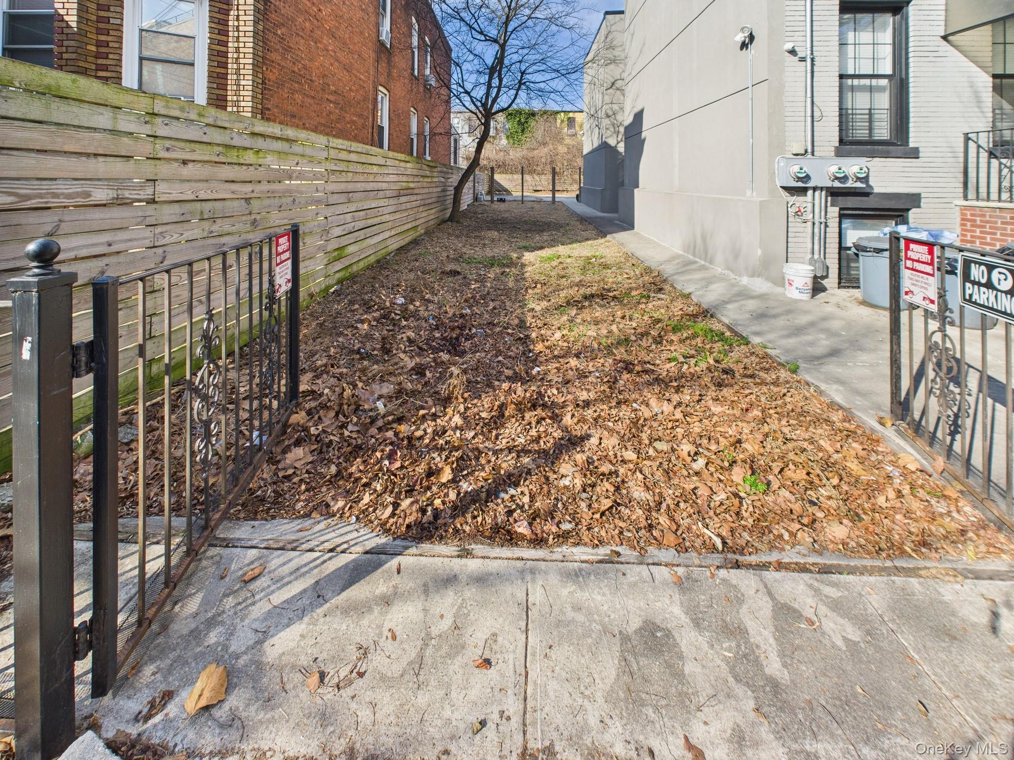 682 Hendrix Street Brooklyn, NY 11207 - Photo 2 of 6 a view of a backyard with pathway
