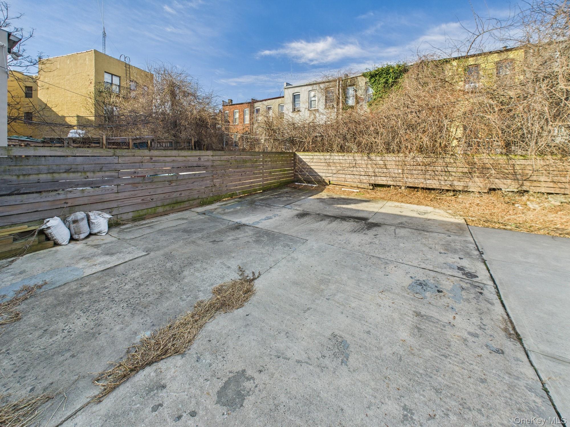 682 Hendrix Street Brooklyn, NY 11207 - Photo 4 of 6 a view of a yard
