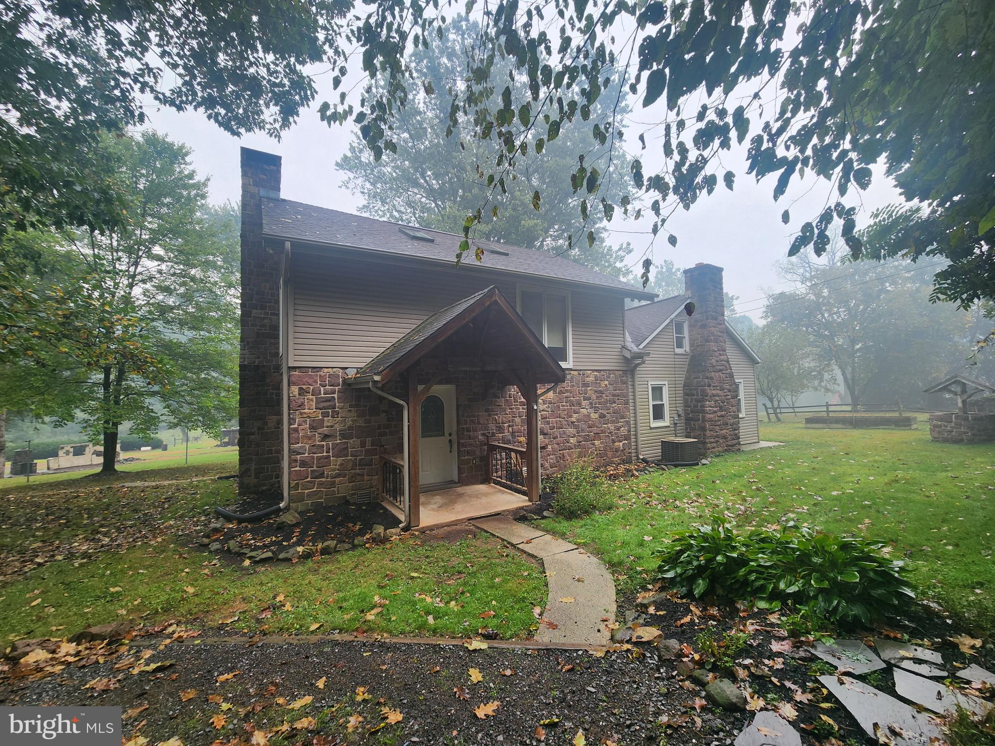 232 Mansion House Road Manheim, PA 17545 - Photo 1 of 107 a view of a house with a yard and large tree