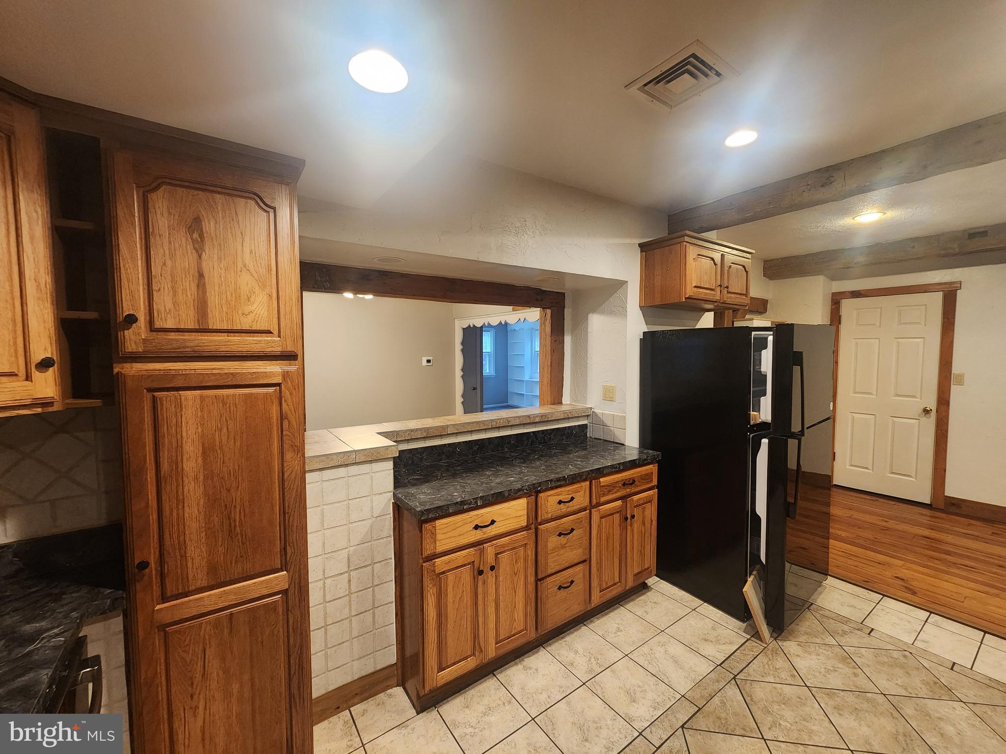 232 Mansion House Road Manheim, PA 17545 - Photo 25 of 107 a kitchen with stainless steel appliances granite countertop a refrigerator and a refrigerator