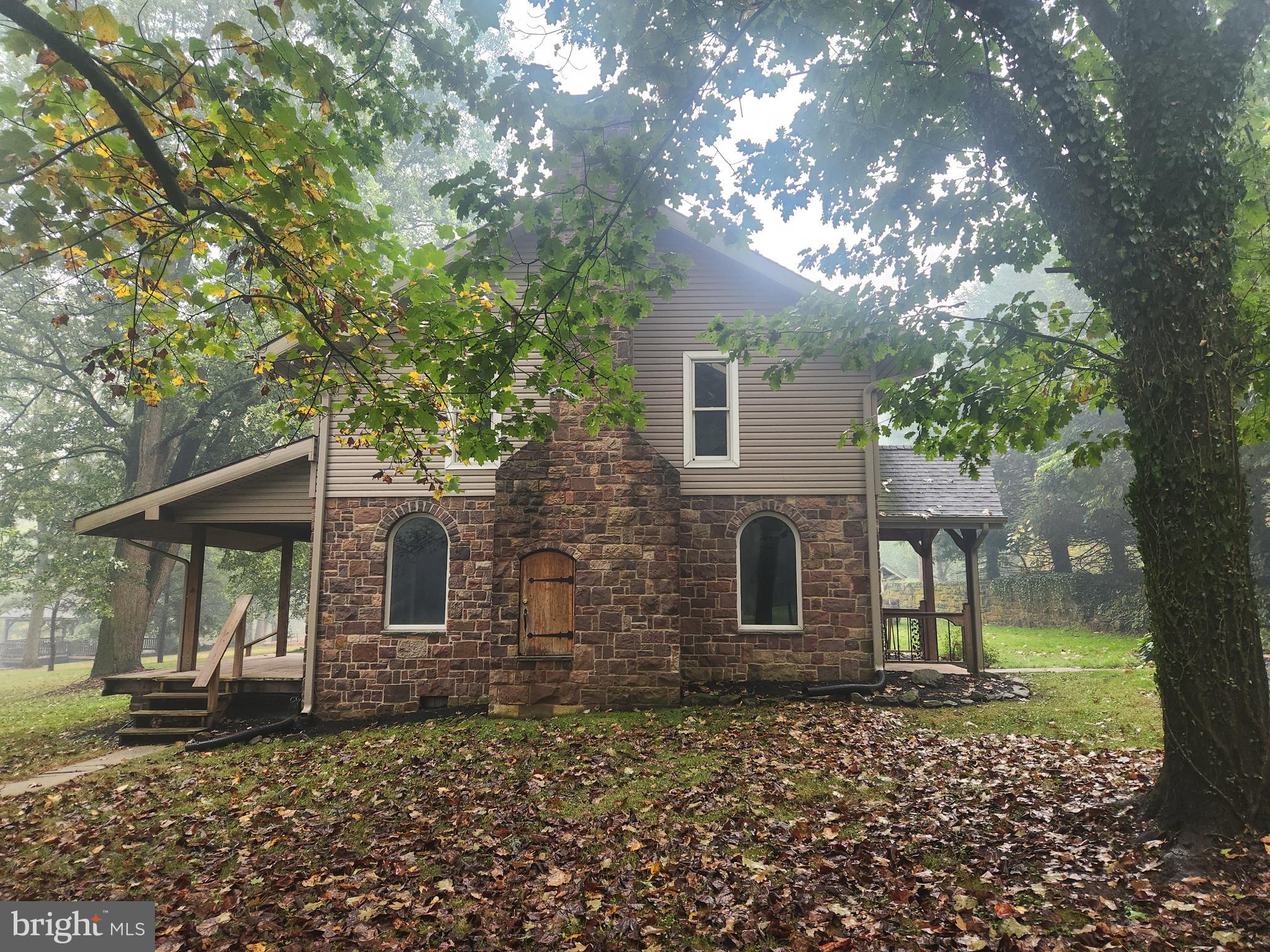 232 Mansion House Road Manheim, PA 17545 - Photo 4 of 107 a front view of a house with garden