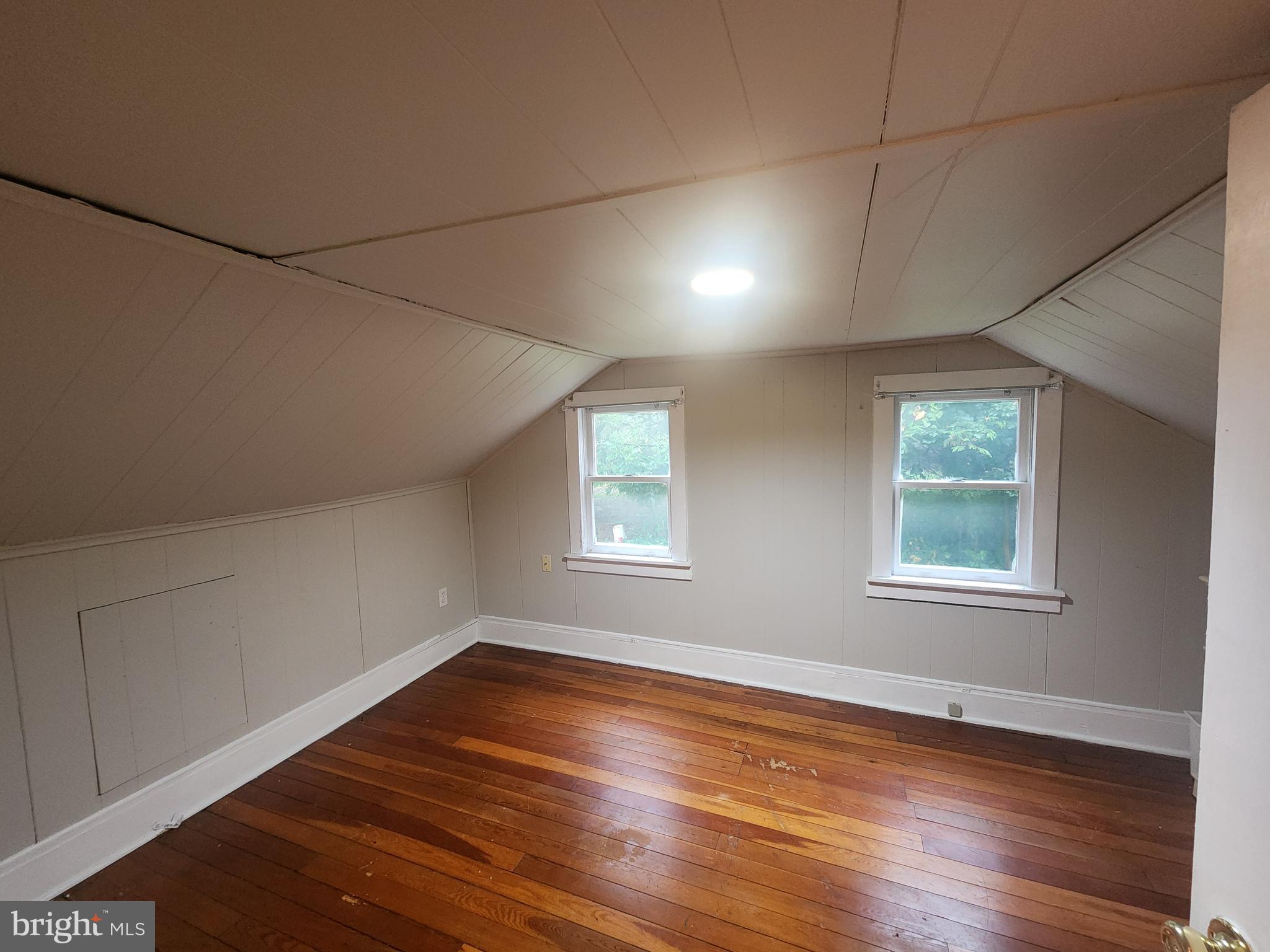 232 Mansion House Road Manheim, PA 17545 - Photo 46 of 107 an empty room with wooden floor and windows