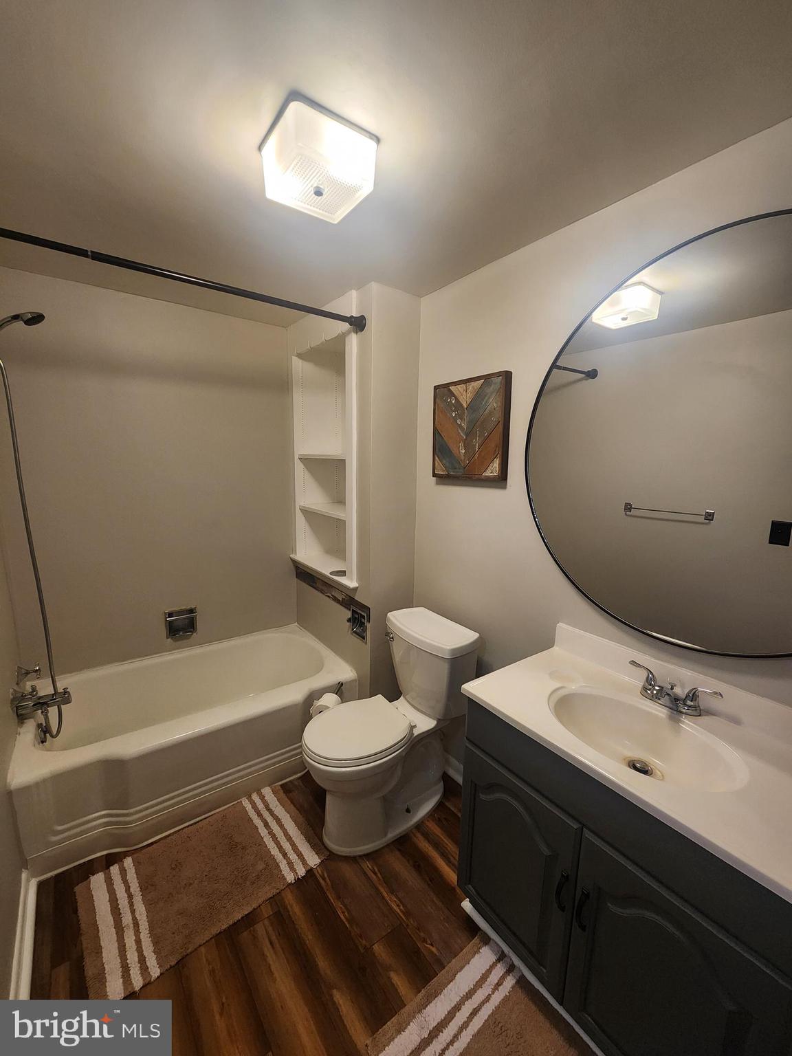 232 Mansion House Road Manheim, PA 17545 - Photo 70 of 107 a bathroom with a double vanity sink toilet mirror and bathtub