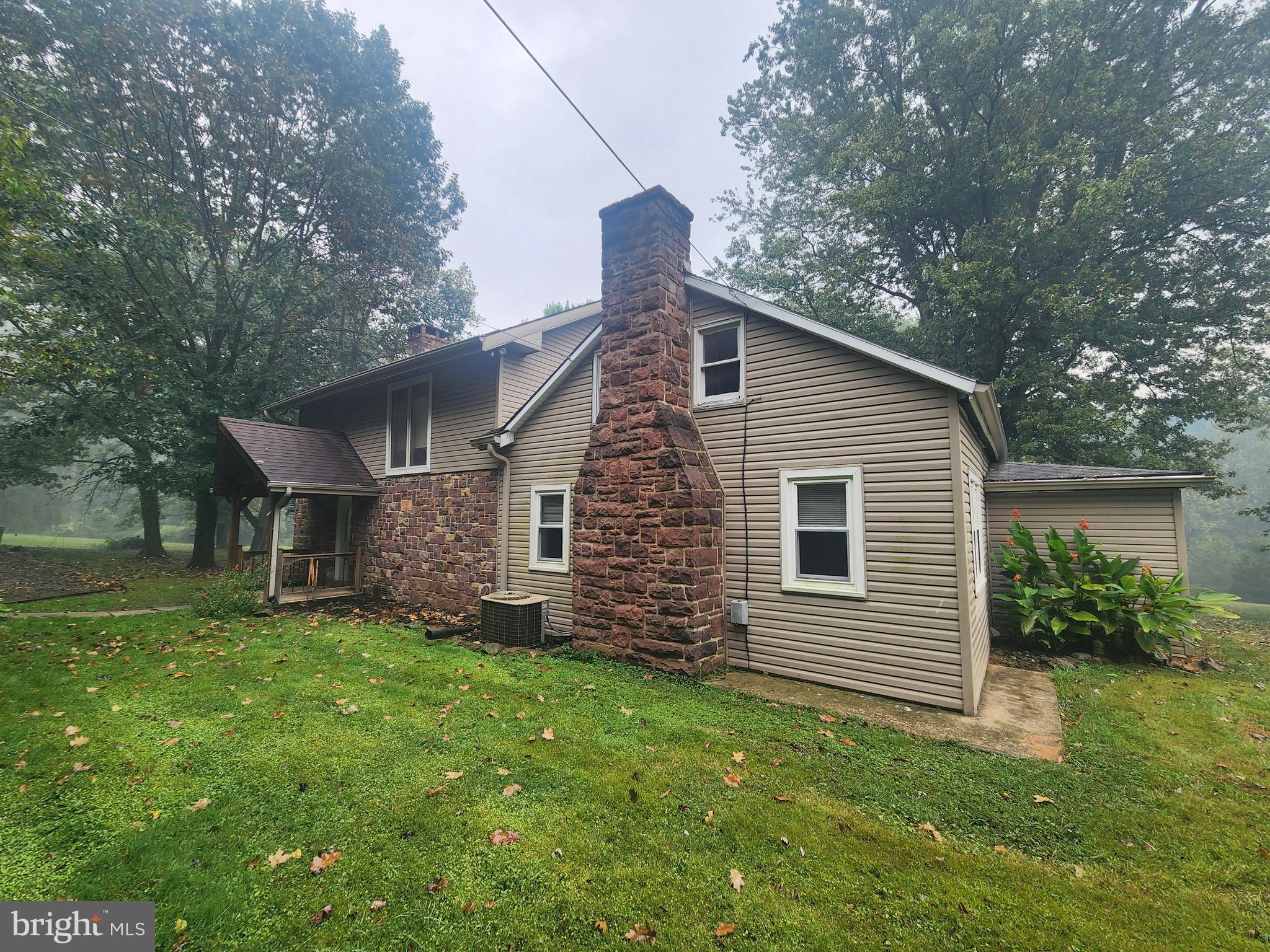 232 Mansion House Road Manheim, PA 17545 - Photo 8 of 107 a front view of house with yard and green space