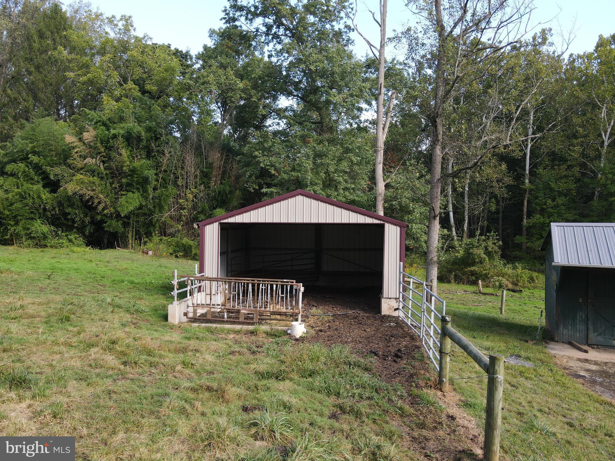 232 Mansion House Road Manheim, PA 17545 - Photo 87 of 107 a backyard of a house with table and chairs