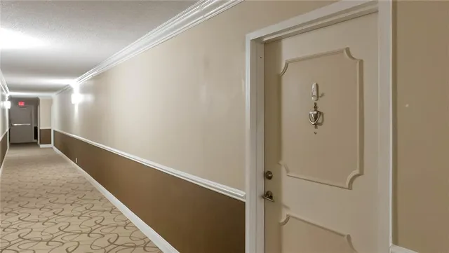 a view of a hallway with entryway