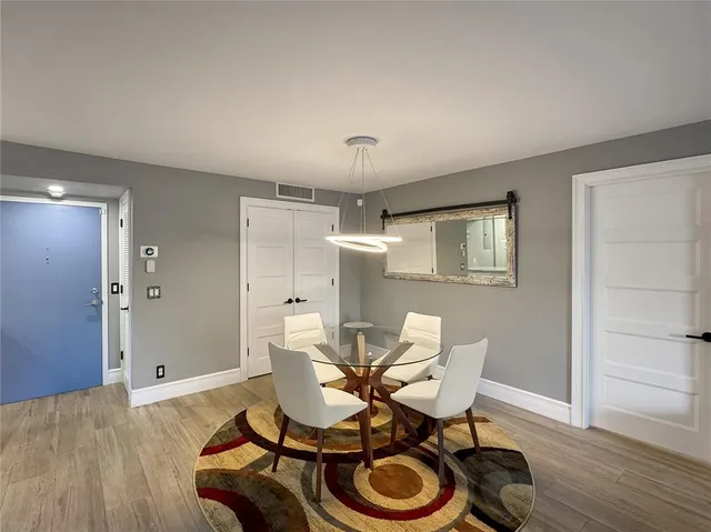 a workspace with furniture and wooden floor