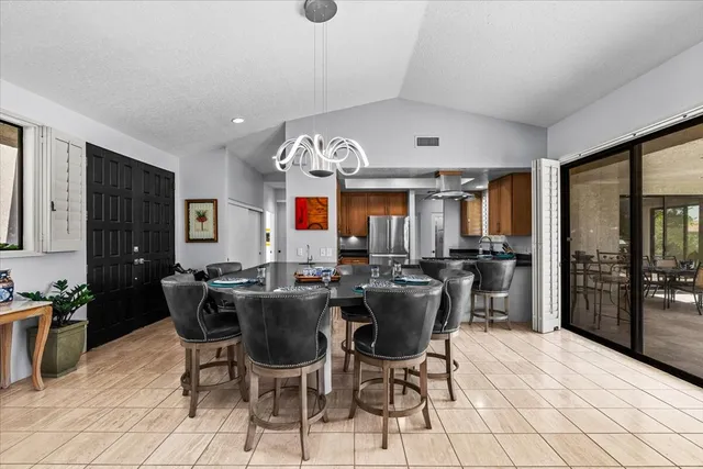 a view of a dining room with furniture