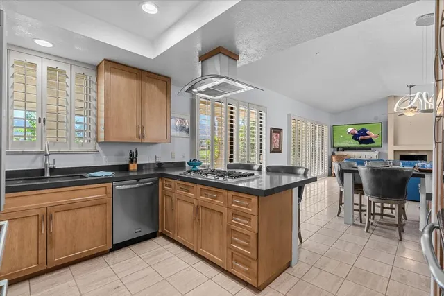 a kitchen with a refrigerator sink and microwave