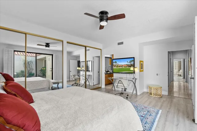 a kitchen with sink refrigerator and window
