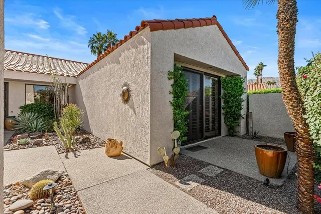a view of an outdoor space with furniture