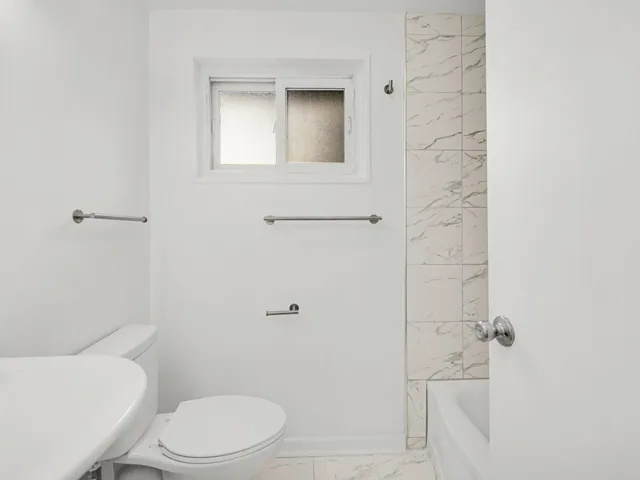 $320,000 | 9457 Kenton Avenue, Unit F, Skokie, IL 60076