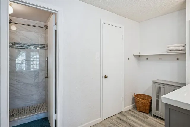 a view of bedroom with wooden floor
