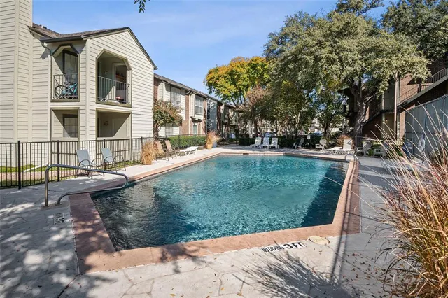 a view of a patio with a yard
