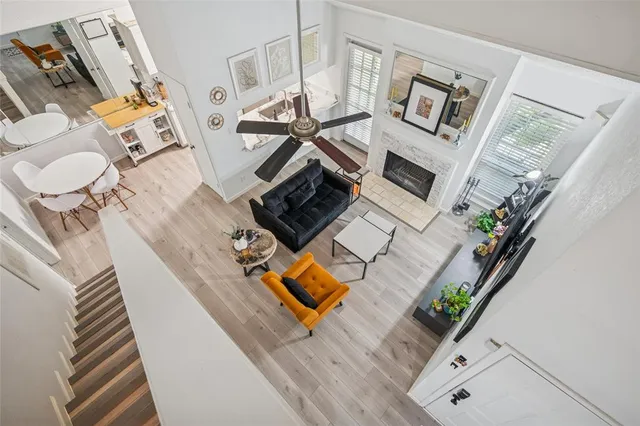 an aerial view of a fireplace with wooden floor