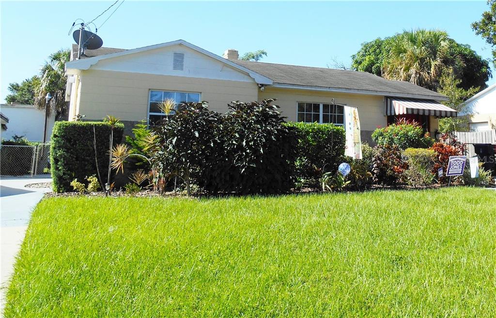 1716 West Grace Street Tampa, FL 33607 - Photo 1 of 1 a front view of house with a garden