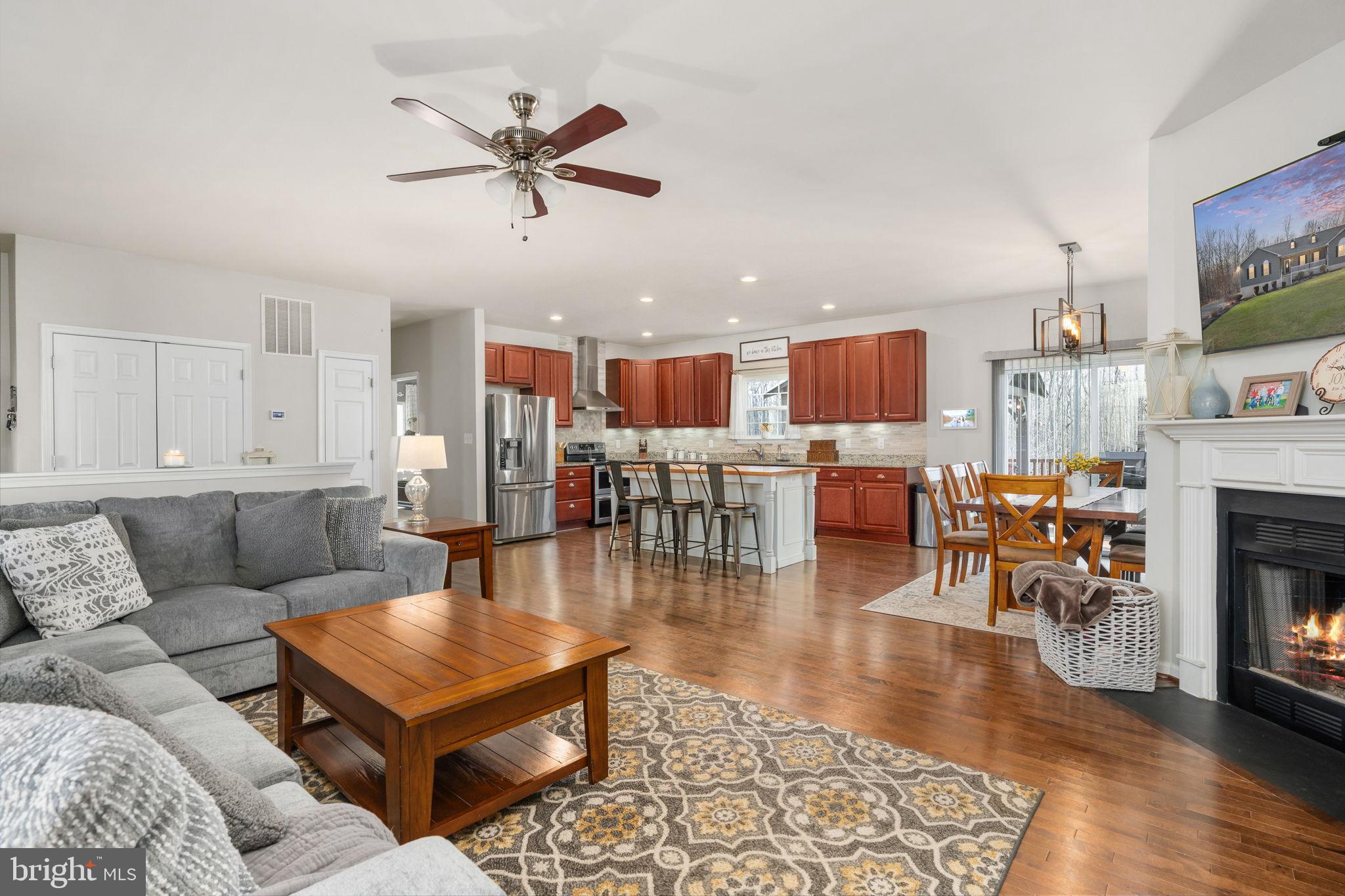 13026 Elk Run Road Bealeton, VA 22712 - Photo 12 of 54 Spacious open-concept living area with warmth.