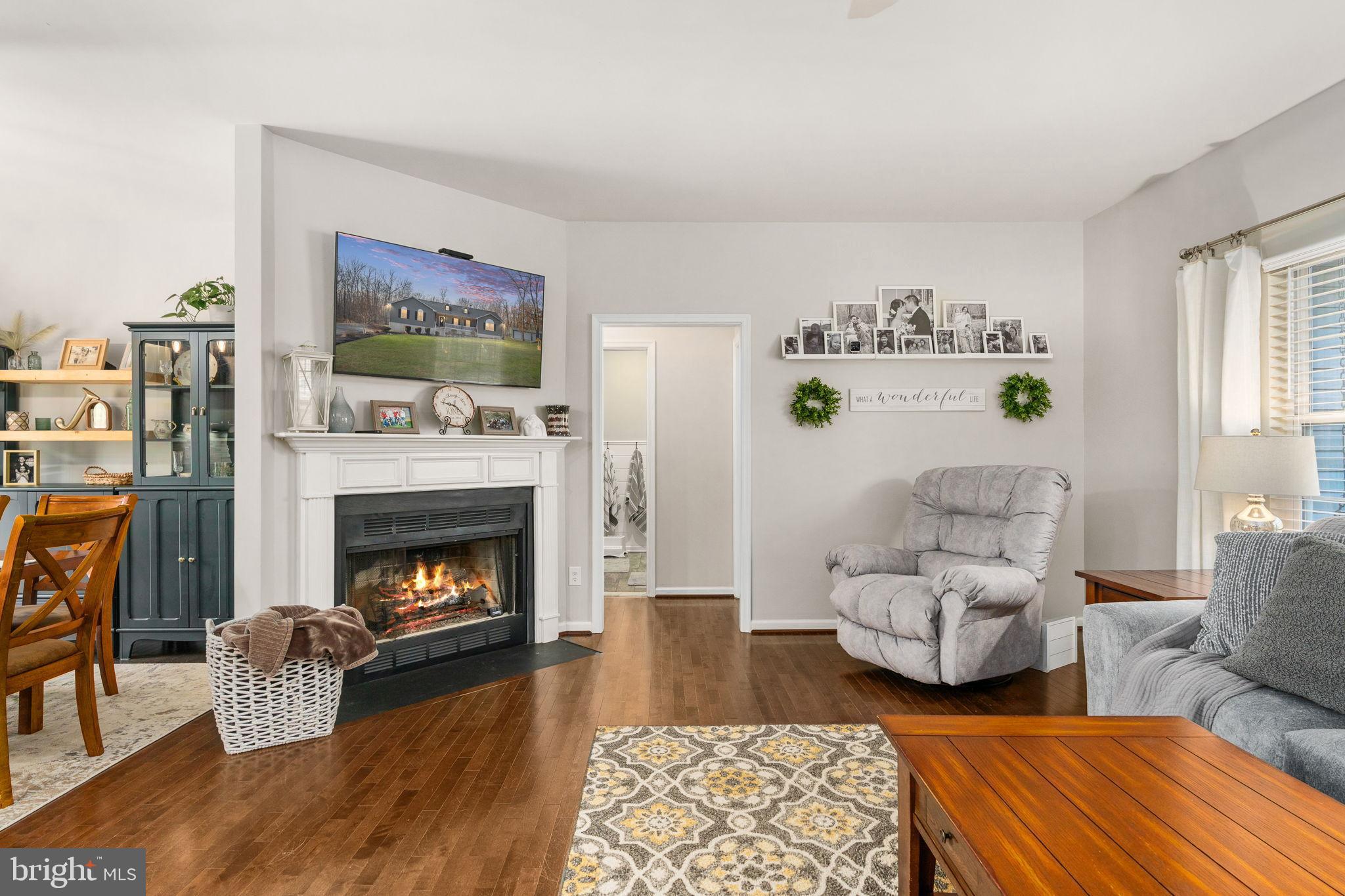 13026 Elk Run Road Bealeton, VA 22712 - Photo 12 of 55 Cozy living space with inviting fireplace.