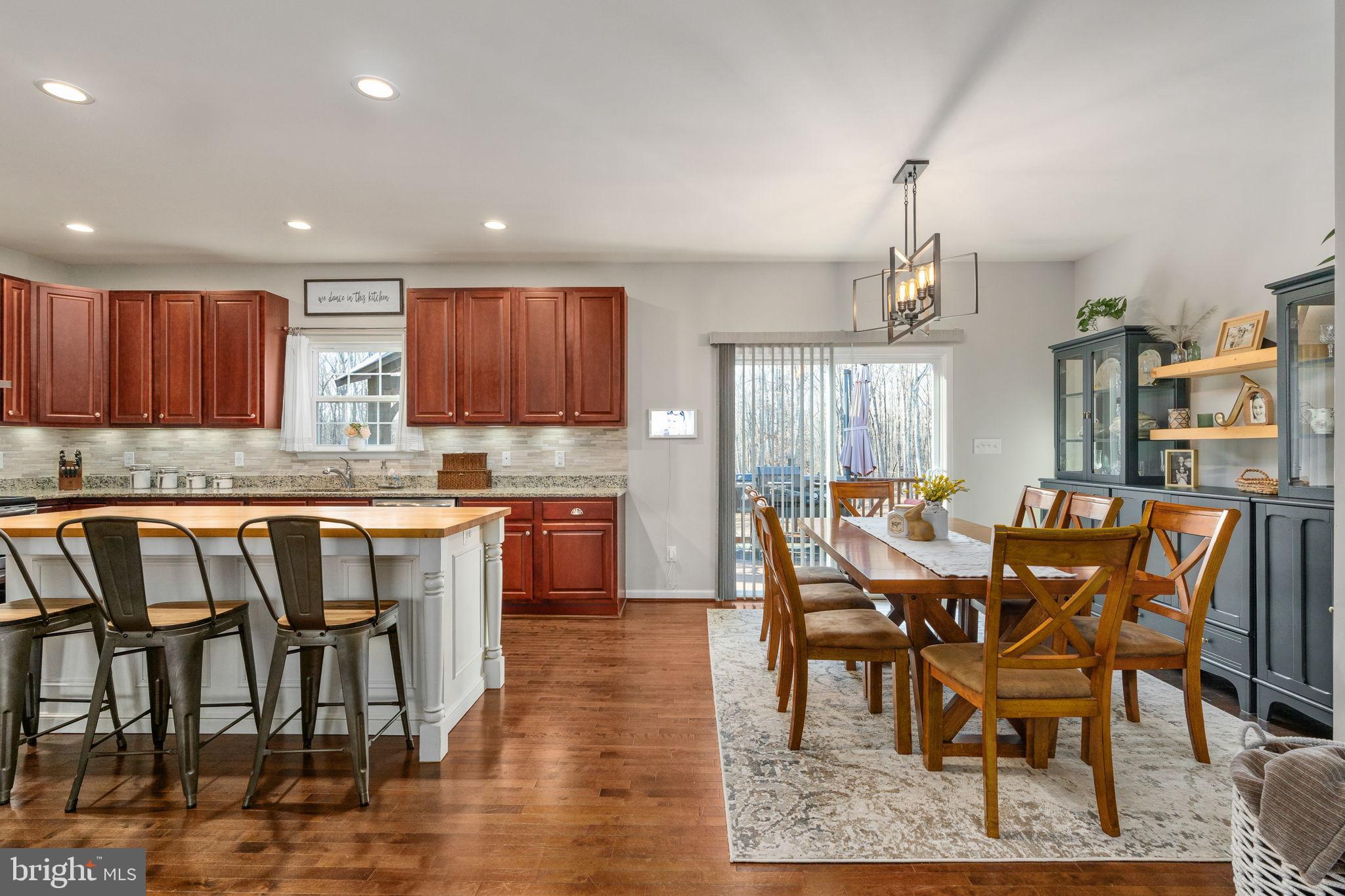 13026 Elk Run Road Bealeton, VA 22712 - Photo 14 of 54 Inviting kitchen and dining area blend warmth.