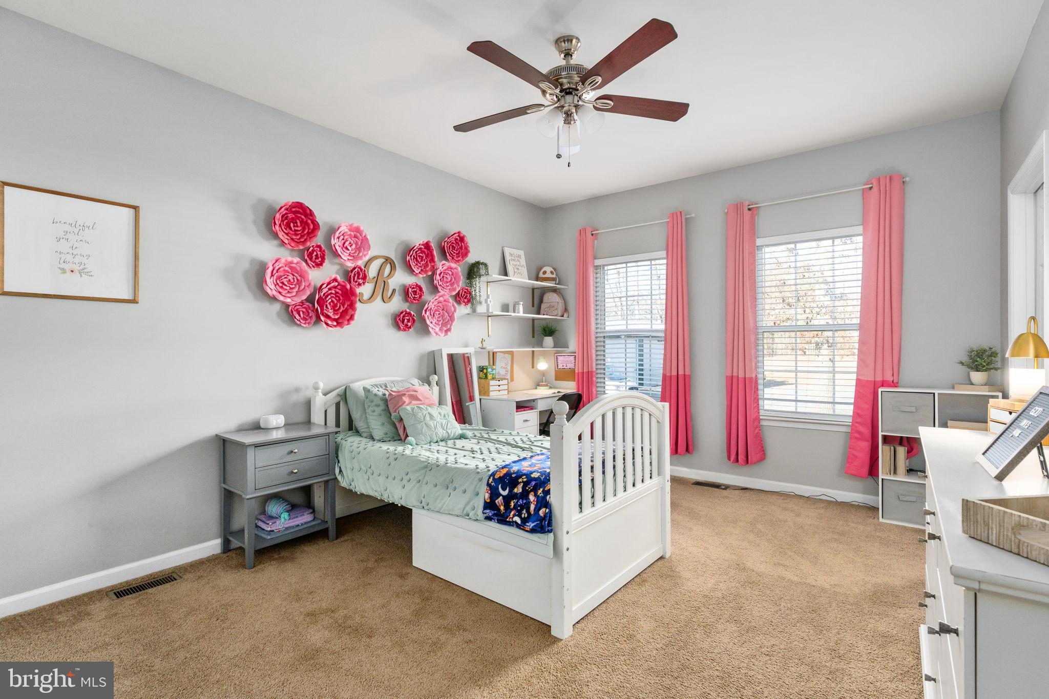 13026 Elk Run Road Bealeton, VA 22712 - Photo 25 of 54 Charming bedroom with playful floral accents.