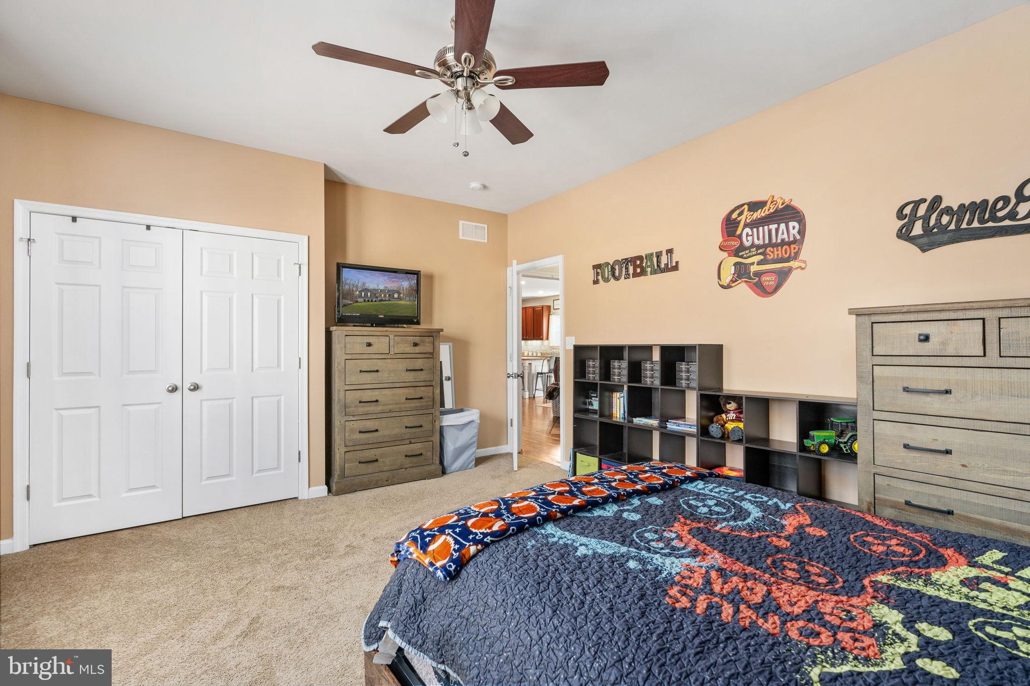 13026 Elk Run Road Bealeton, VA 22712 - Photo 25 of 55 Charming bedroom with playful decor accents.